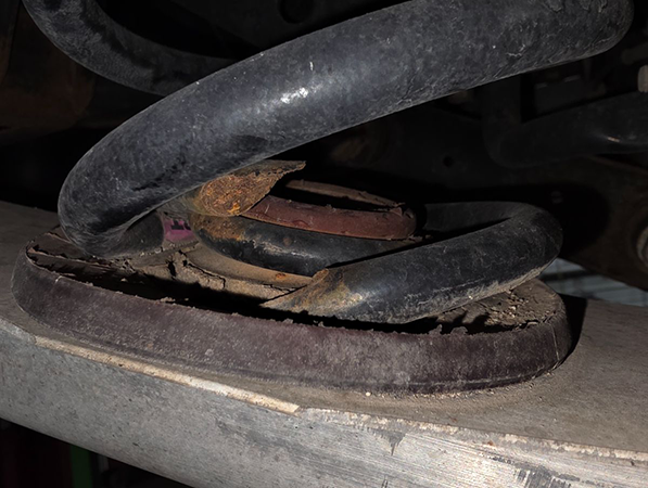 Vehicle sitting low indicating sagging suspension or air ride leak