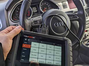 Diagnostic scan tool connected to a European diesel vehicle for live data testing
