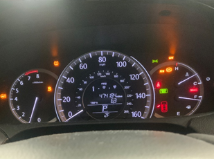 Dashboard warning lights for ABS and airbag with diagnostic scan tool connected